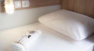 Гостиница Ель Хостел и Кофейня Москва Односпальная кровать в общем номере с 4 кроватями-8